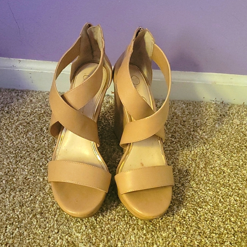 Jessica Simpson wedges in tan. They are a size 9